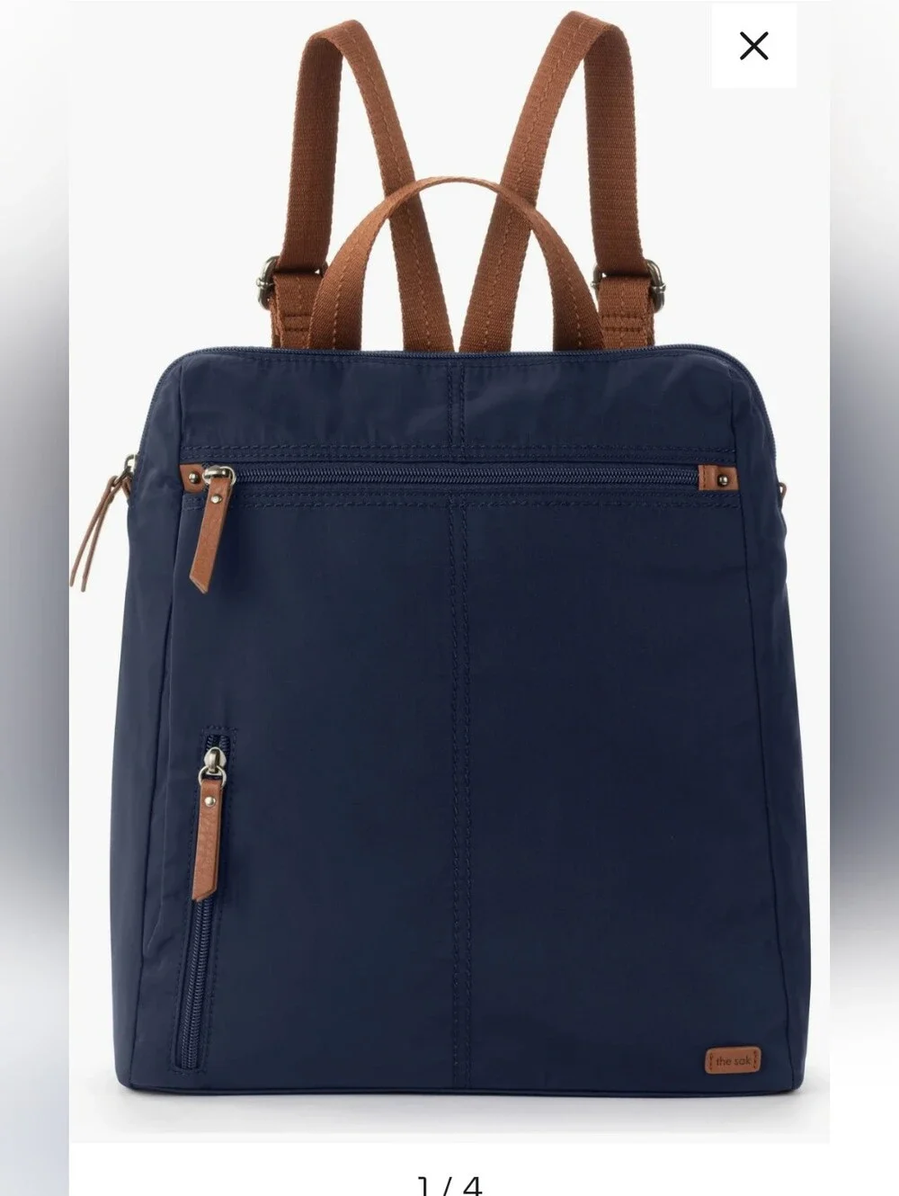 The Sak Navy Backpack with Brown Trim and Straps